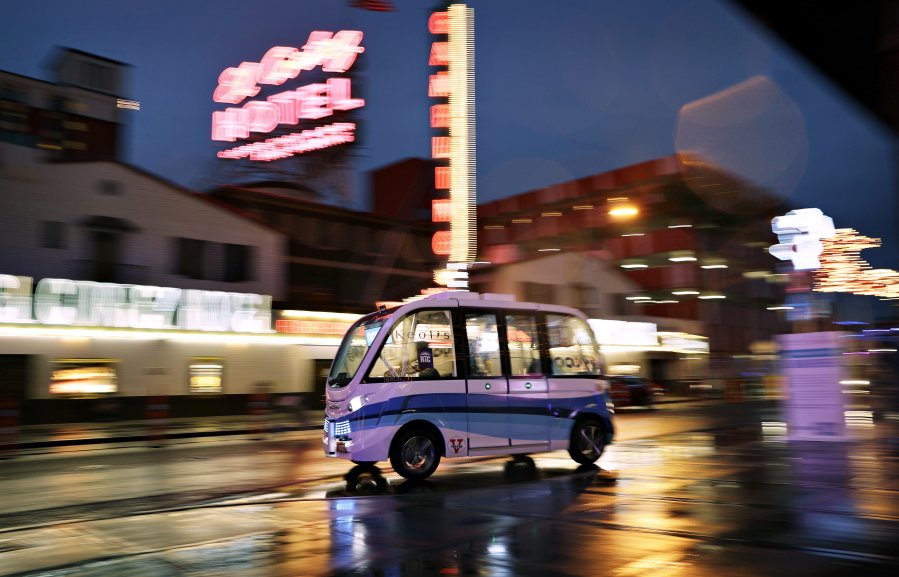 The Navya Arma autonomous vehicle travels along a street Thursday in Las Vegas.