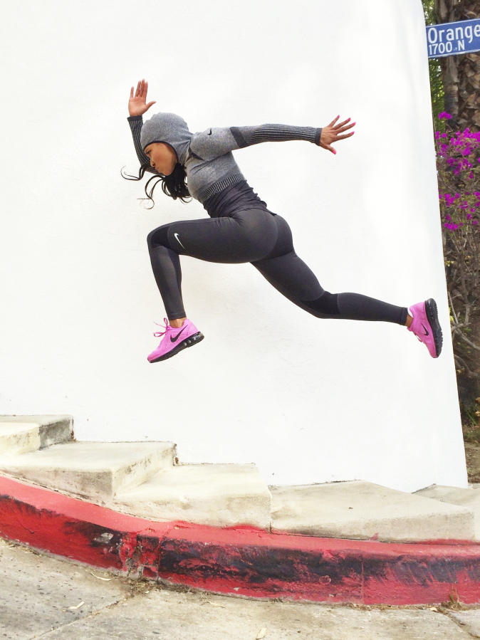 Trainer Jeanette Jenkins strides up a set of stairs during a workout.