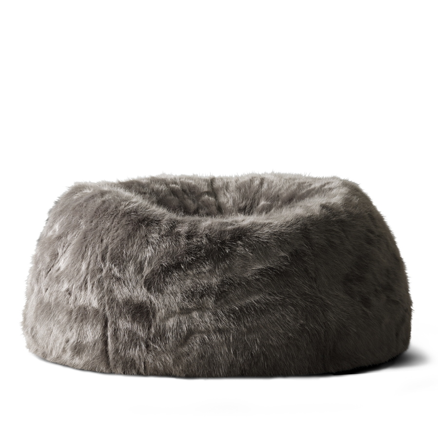 This photo provided by RH, Restoration Hardware, shows a squooshy, faux fur bean bag chair.