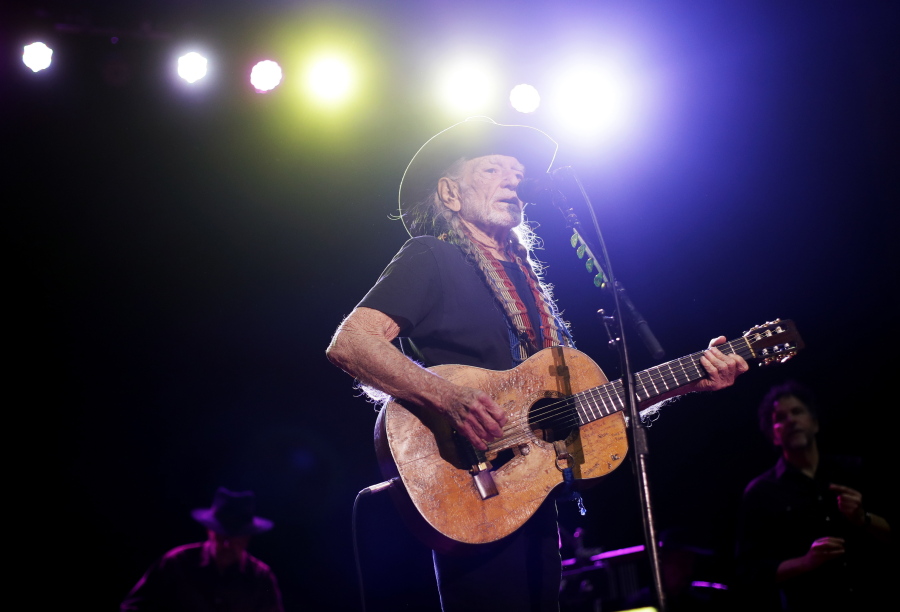 Willie Nelson performs Jan. 7 in Nashville, Tenn. The 83-year-old outlaw country icon wants to help a lot of people give marijuana a try.