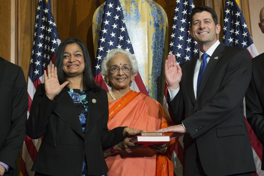 House Speaker Paul Ryan administers the House oath of office to Rep. Pramila Jayapal, D-Wash., during a mock swearing in ceremony on Capitol Hill, Tuesday in Washington.