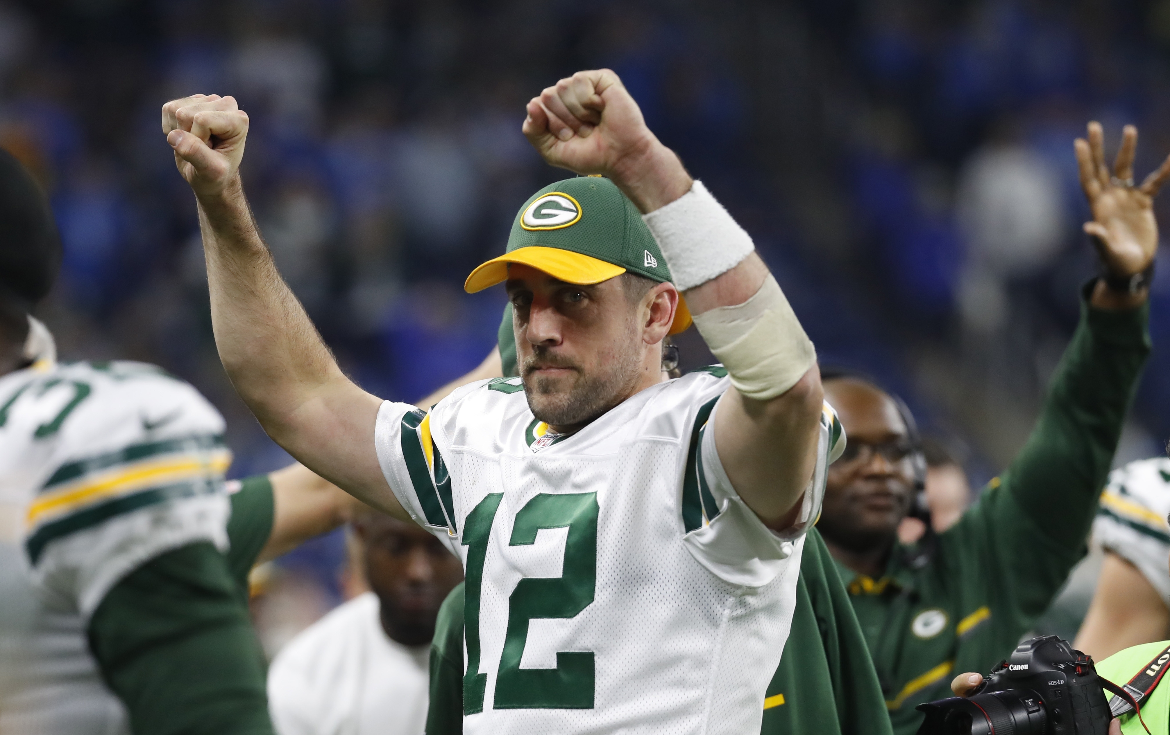 Green Bay Packers quarterback Aaron Rodgers reacts on the bench after an NFL football game against the Detroit Lions, Sunday, Jan. 1, 2017, in Detroit. The Packers defeated the Lions 31-24.
