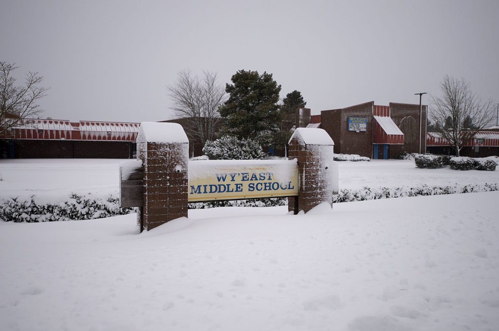 Snow blankets the front of Wy'East Middle School as school was closed to students around Clark County due to the weather Wednesday morning, Jan. 11, 2017.
