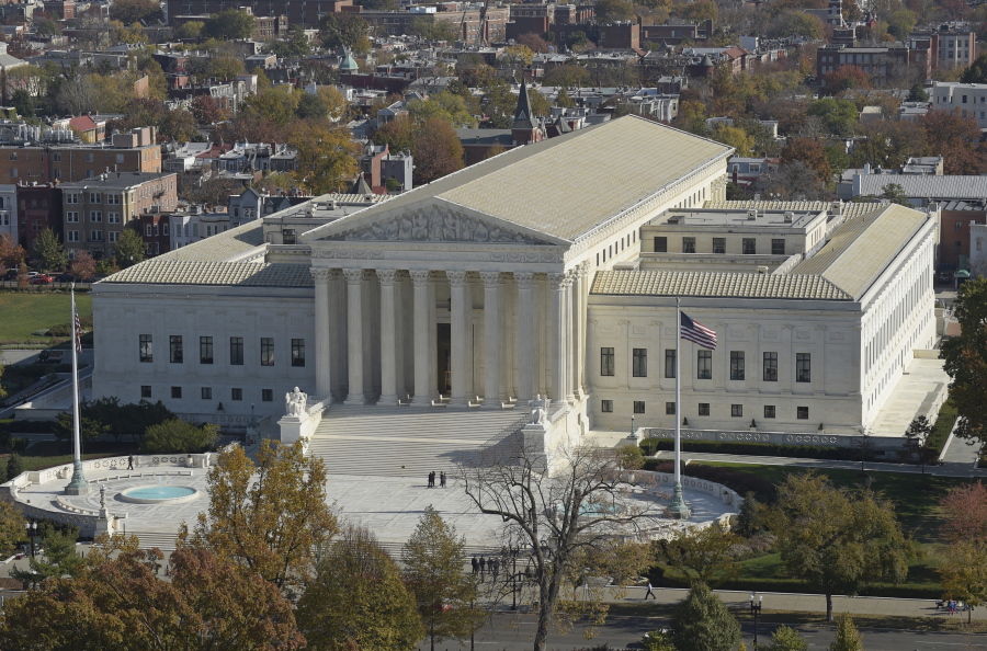 This Nov. 15, 2016 photo shows a view of the Supreme Court from the Capitol Dome, on Capitol Hill in Washington. An Asian-American rock band called the Slants has spent years locked in a legal battle with the government over its refusal to trademark the band???s name.  The fight will play out Wednesday at the Supreme Court as the justices consider whether a law barring disparaging trademarks violates the band&#039;s free speech rights.