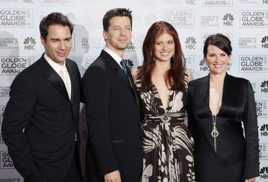 Cast members from the comedy series &quot;Will &amp; Grace,&quot; Eric McCormack, from left, Sean Hayes, Debra Messing and Megan Mullally, pose backstage Jan. 16, 2006, after making an award presentation at the 63rd Annual Golden Globe Awards in Beverly Hills, Calif. &quot;Will &amp; Grace&quot; will make a comeback on NBC with 10 new episodes of the hit comedy to air during the 2017-18 season.