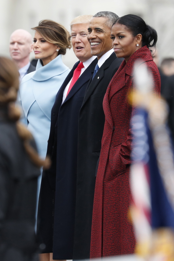 First lady Melania Trump, from left, stands with President Donald Trump, former President Barack Obama, and former first lady Michelle Obama on the steps of the East Front of the U.S. Capitol during a departure ceremony for Obama on Friday.