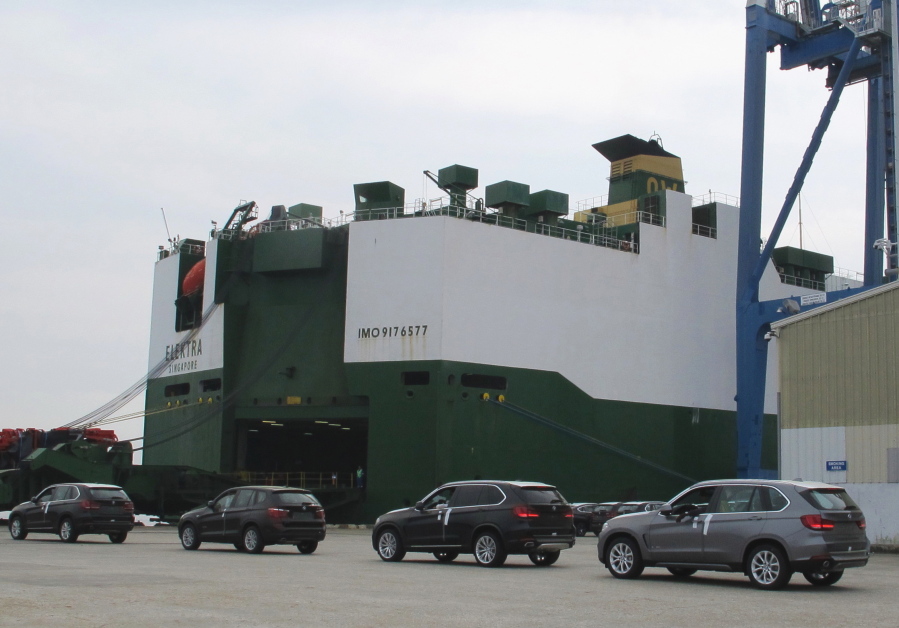 BMWs manufactured at the company&#039;s plant in Greer, S.C., are driven onto a ship in Charleston, S.C., in March.