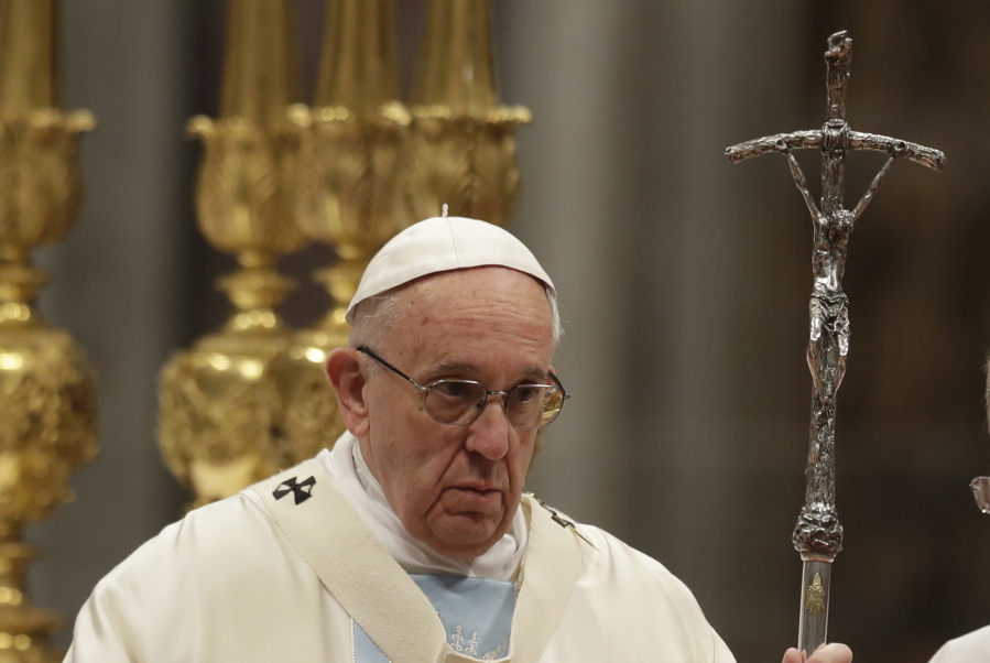 Pope Francis celebrates a new year&#039;s Mass in St. Peter&#039;s Basilica at the Vatican on Sunday.