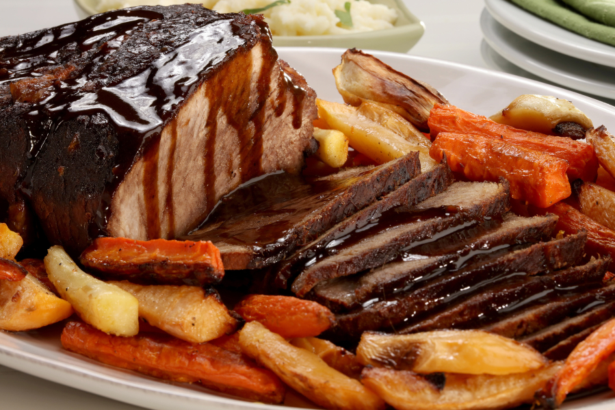 Serve the finished roast with the braising liquid and vegetables or starch of your choice.