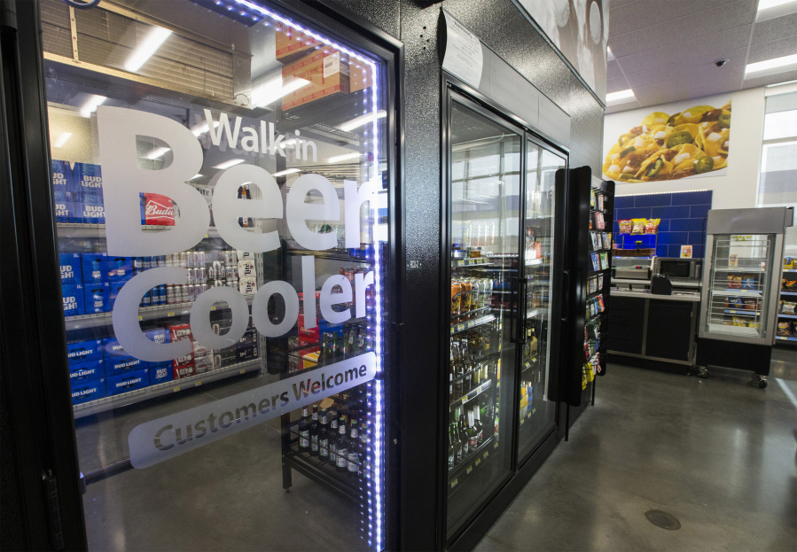 A walk-in beer cooler inside a new Wal-Mart convenience store in Crowley, Texas.