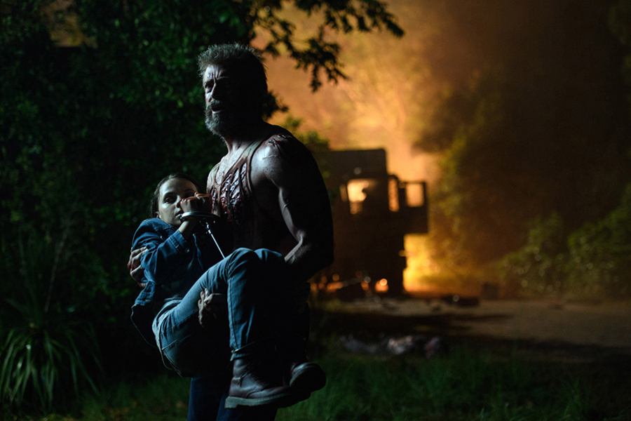 Logan/Wolverine played by Hugh Jackman tries to protect young mutant Laura played by Dafne Keen in &quot;Logan.&quot; (Ben Rothstein)