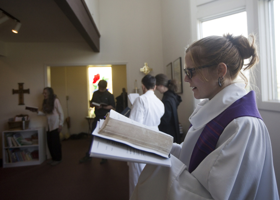 The Rev. Jessie Smith sings a hymn during a Sunday service in December at St. Anne&#039;s Episcopal Church in Washougal.