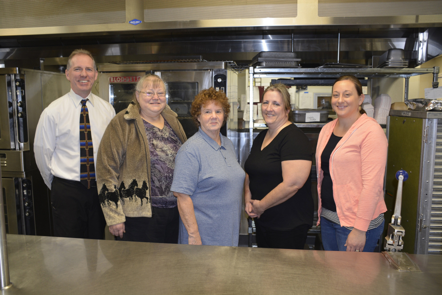 Washougal: Sodexo Nutrition Services Director Mark Jasper, from left, with Washougal School District kitchen staffers Laura Spangenberg, Sharon House, Nancy Sonneson and Megan Bettis, who received all clean reports during recent inspections.