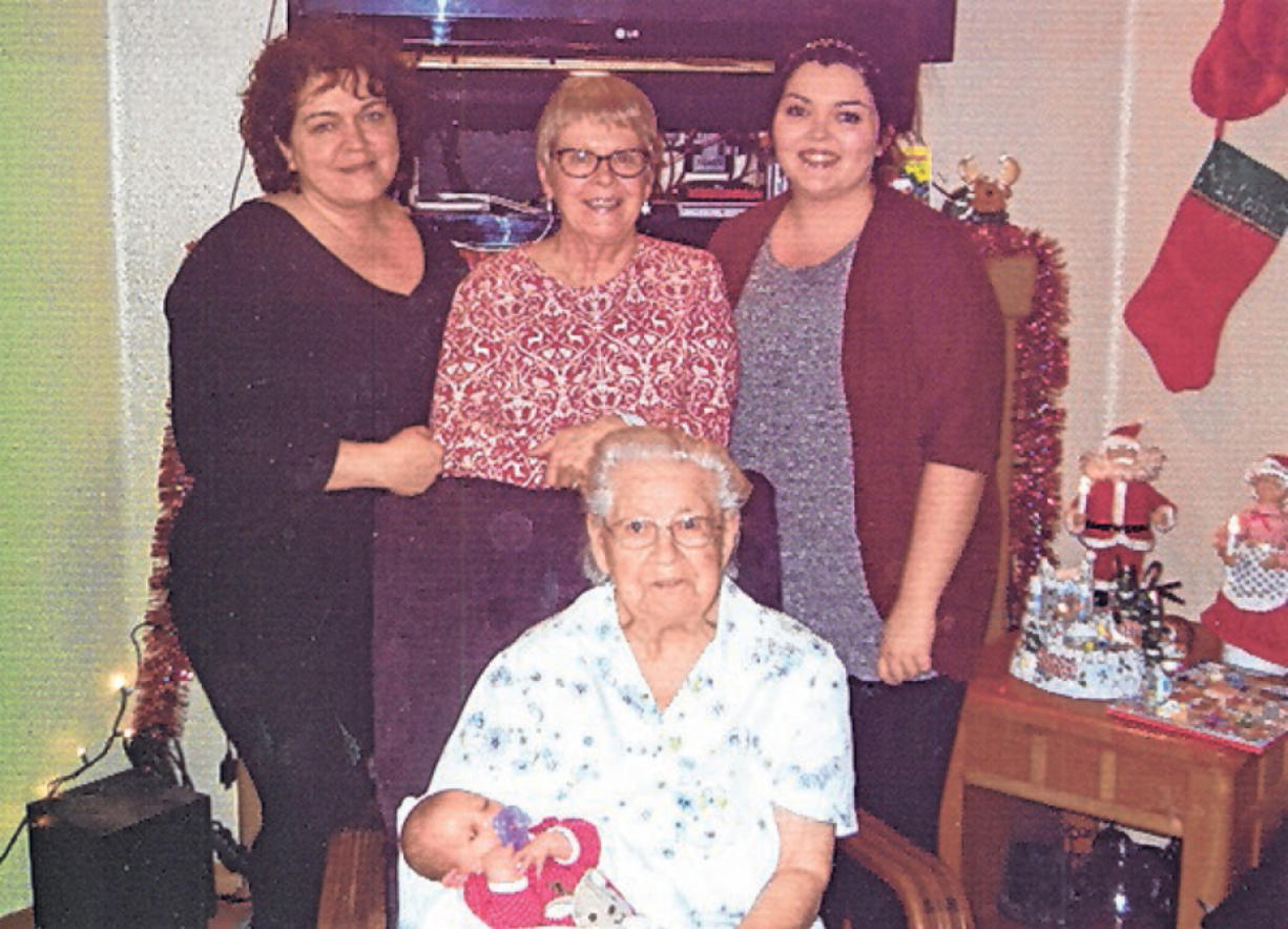 Amelia Everly Small of Battle Ground, born Nov. 21, is held by her great-great-grandmother, Vivian Leadbetter, 96, of Longview at their first meeting at Christmastime.