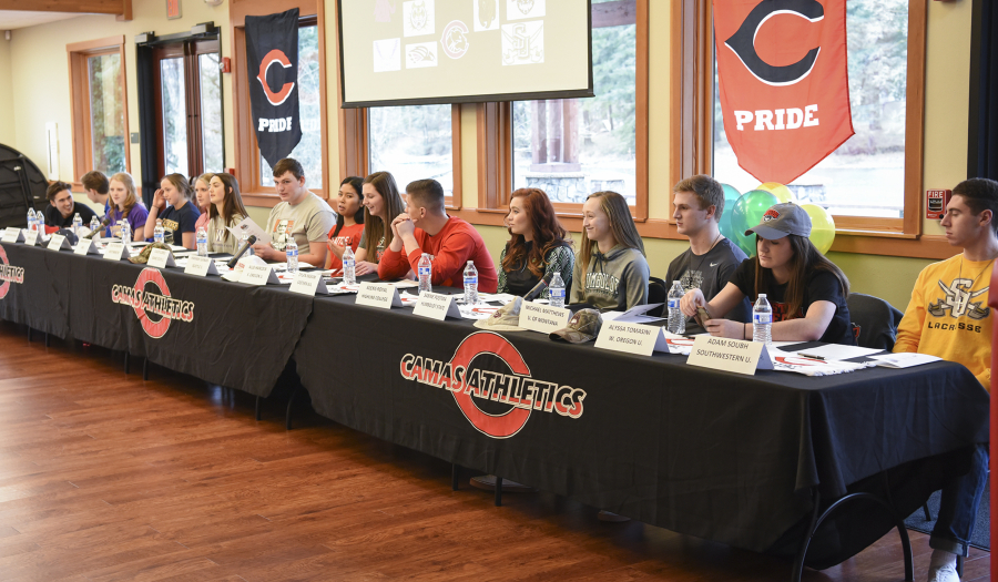 Camas High School senior athletes are honored during a signing ceremony at Lacamas Lake Lodge in Camas, Wednesday February 1, 2017.