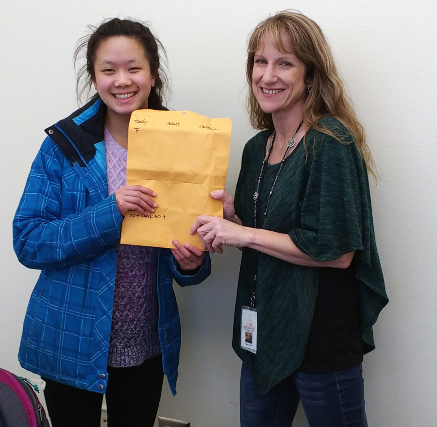East Vancouver: Shahala Middle School student Ashley Lin, left, and Peggy Carlson, Evergreen Public Schools&#039; Students in Transition liaison, after Lin raised $752 for the program with a pancake breakfast.