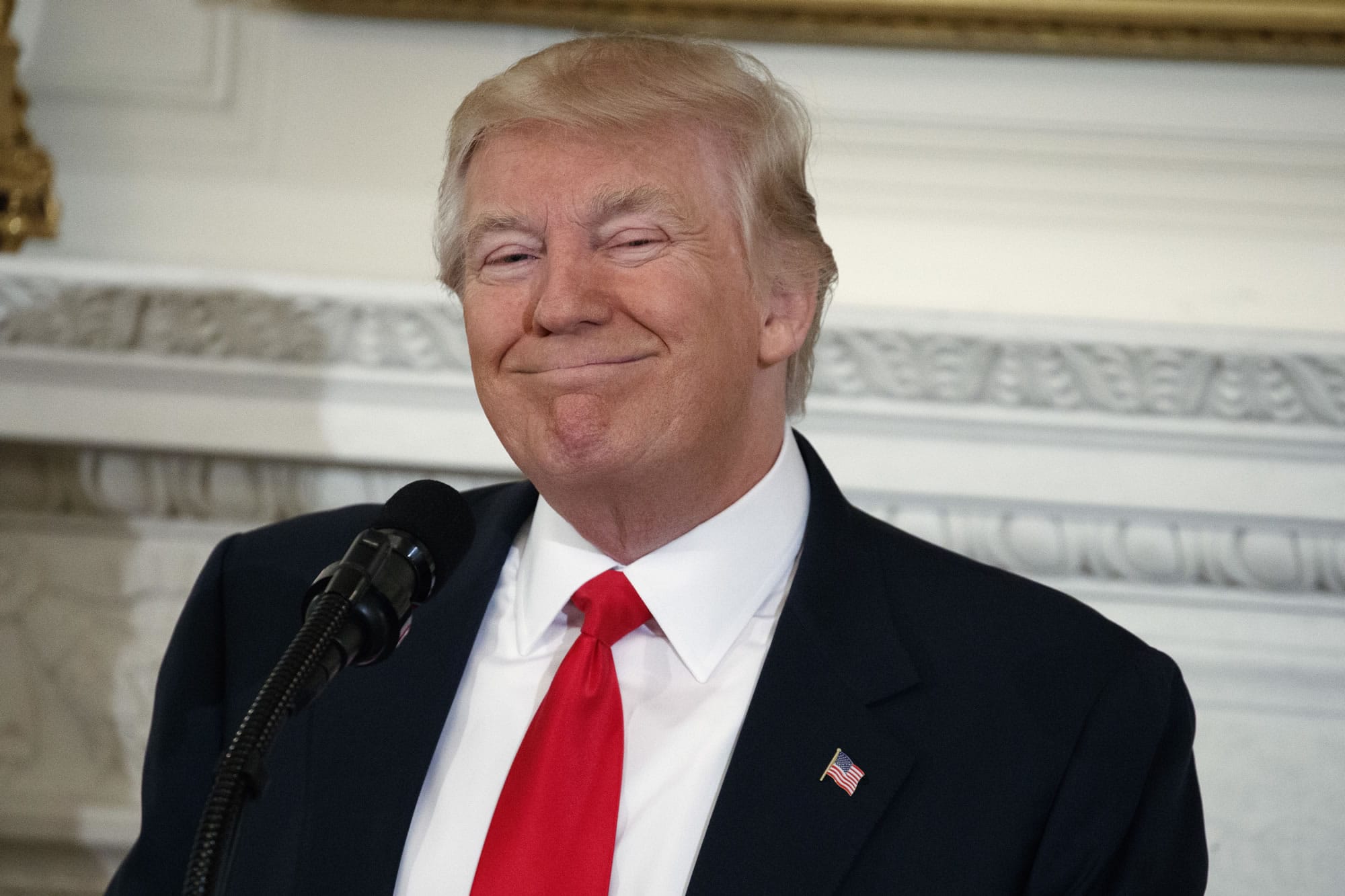 President Donald Trump smiles while speaking to a meeting of the National Governors Association, Monday, Feb. 27, 2017, at the White House in Washington.