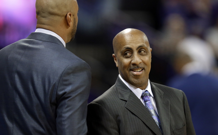 Washington coach Lorenzo Romar, right, greets a member of the Arizona State coaching staff before an NCAA college basketball game, Thursday, Feb. 16, 2017, in Seattle. (AP Photo/Ted S. Warren) (Ted S.