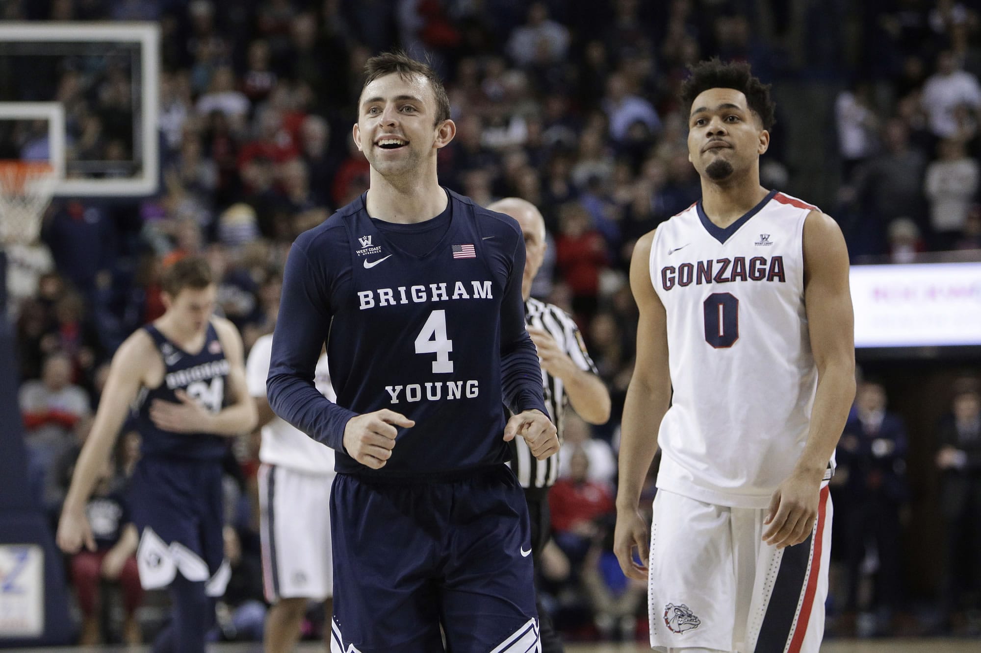 BYU guard Nick Emery (4) smiles near the end of the second half of the team's NCAA college basketball game against Gonzaga in Spokane, Wash., Saturday, Feb. 25, 2017. BYU won 79-71.