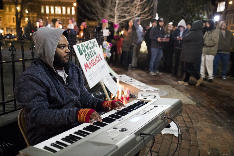Jerone Williams plays piano during a Bowling Green &quot;massacre&quot; remembrance gathering on Friday, Feb. 3, 2017, at Fountain Square Park in Bowling Green, Ky. The &quot;massacre&quot; that never happened has Bowling Green in the national news again ??? something that has not happened since a sinkhole swallowed several prized Corvettes at a museum.