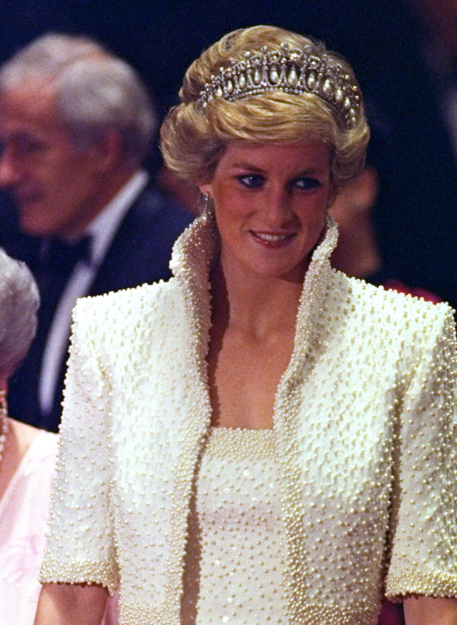 The Princess of Wales, spangled with pearls, visits Hong Kong in 1989.