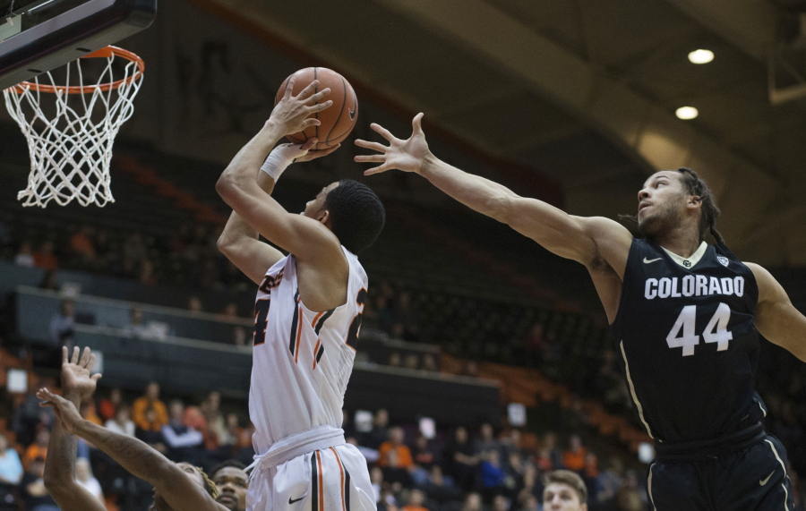 Oregon State&#039;s Kendal Manuel, left, goes to the basket past Colorado&#039;s Josh Fortune (44) during the first half of an NCAA college basketball game in Corvallis, Ore., Thursday, Feb. 16, 2017. (AP Photo/Timothy J.