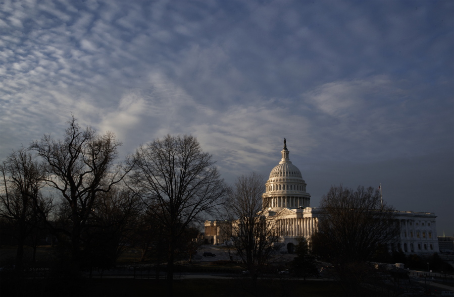 FILE - In this Feb. 17, 2017 file photo, the Capitol is seen at sunup in Washington. Congress returns to Washington to confront dramatic decisions on health care and the Supreme Court that may help determine the course of Donald Trump???s presidency.  (AP Photo/J.