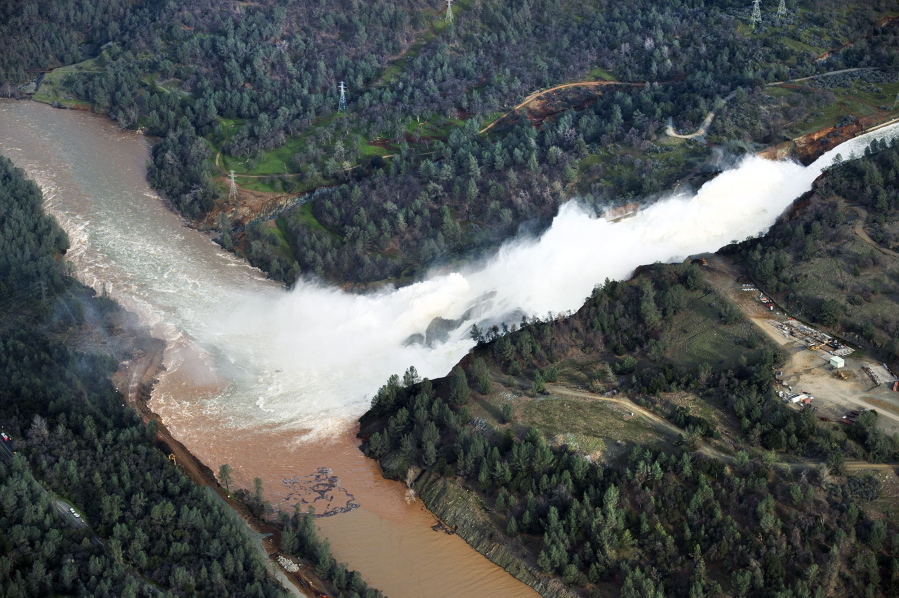 Water continues to run down the main spillway at Lake Oroville on Monday in Oroville, Calif. The water level dropped Monday behind the nation&#039;s tallest dam, reducing the risk of a catastrophic spillway collapse and easing fears that prompted the evacuation of nearly 200,000 people downstream.  Sunday afternoon&#039;s evacuation order came after engineers spotted a hole on the concrete lip of the secondary spillway for the 770-foot-tall Oroville Dam and told authorities that it could fail within the hour.