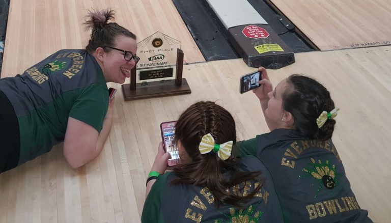 Evergreen bowlers celebrate their 3A state championship with some photos.
