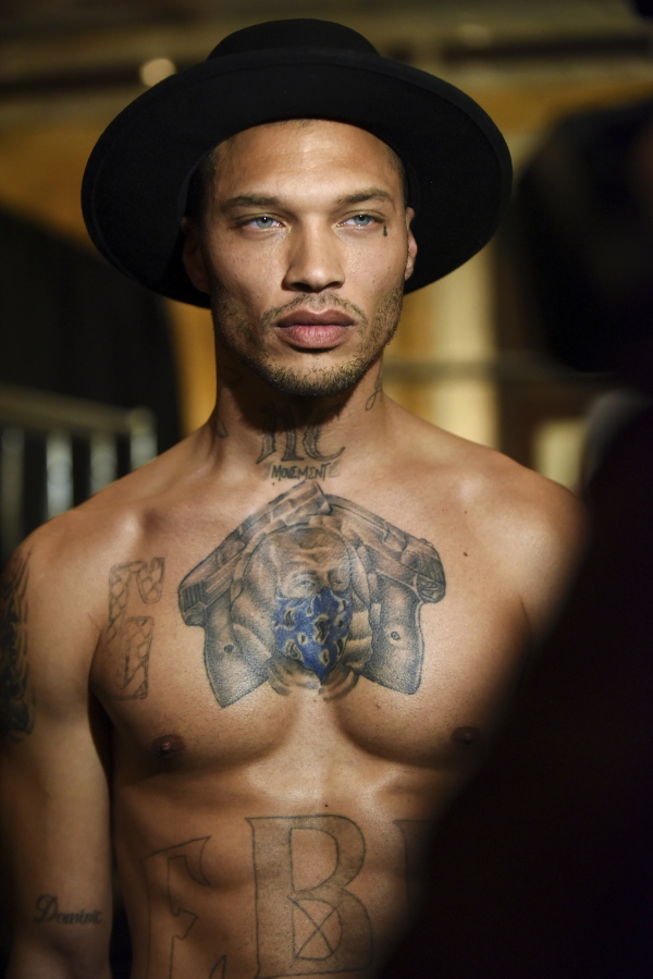 Jeremy Meeks, the model who was referred to as &quot;the hot mugshot guy,&quot; poses backstage before the Philipp Plein fashion show.