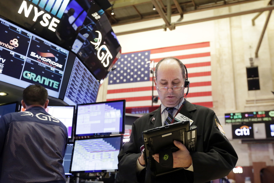 Trader Gordon Charlop works on the floor of the New York Stock Exchange on Thursday.