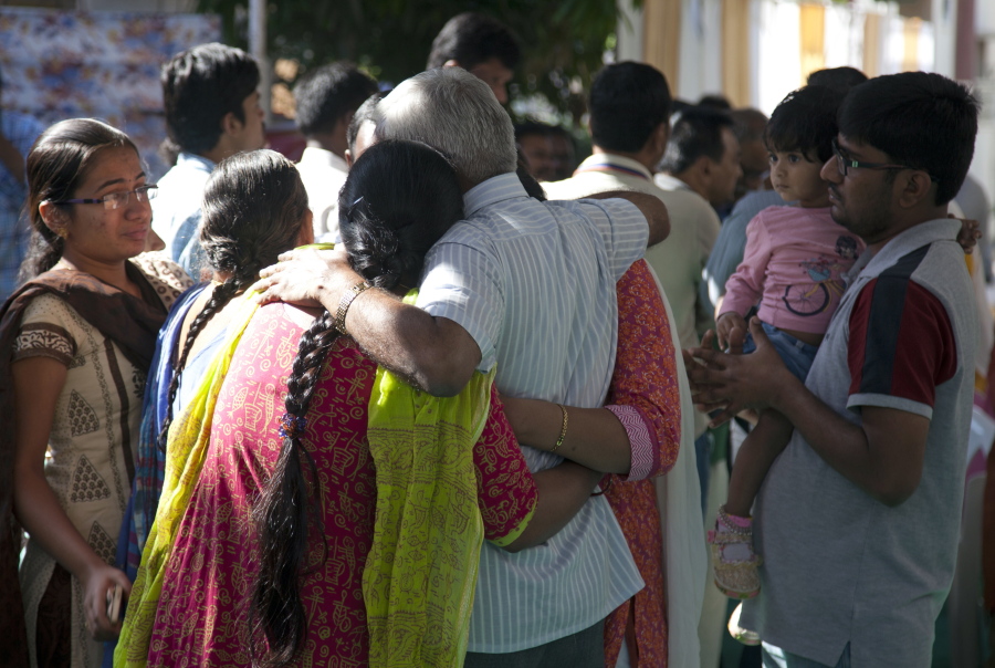 Relatives grieve as last rites are performed on Srinivas Kuchibhotla, a 32-year-old engineer who was killed in an apparently racially motivated shooting in a crowded Kansas bar, at his residence in Hyderabad, India, on Tuesday. According to witnesses, the gunman yelled &quot;get out of my country&quot; at Kuchibhotla and Alok Madasani before he opened fire at Austin&#039;s Bar and Grill in Olathe, Kansas, a suburb of Kansas City, on Wednesday evening. Both men had come to the U.S. from India to study and worked as engineers at GPS-maker Garmin.