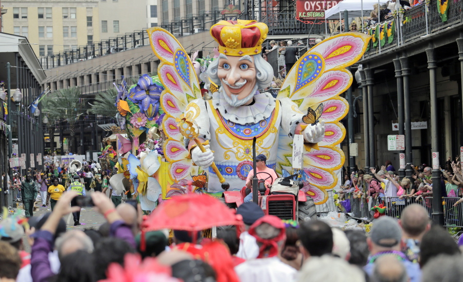 The Krewe of Rex parade rolls down St. Charles Avenue nearing Canal Street on Tuesday in celebration of Mardi Gras in New Orleans.