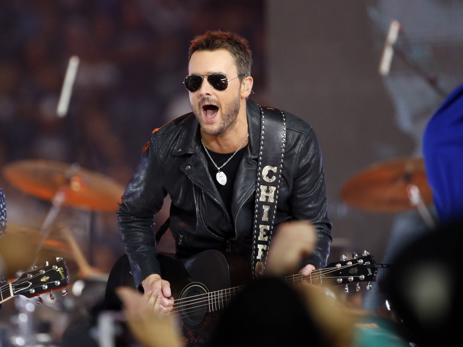 Country music singer Eric Church performs at halftime during an NFL football game between the Washington Redskins and Dallas Cowboys in Arlington, Texas.