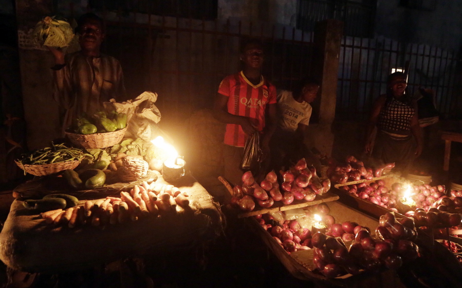 Vegetable vendors ply their wares by the light of locally-made lanterns in Lagos, Nigeria. In Nigeria, for the cost of powering a small generator for two hours, Dutch company Lumos offer enough solar power to light a house, cool a room with a fan and charge cell phones for about eight hours. For a country without a secure supply of electricity where people are dependent on candles, batteries, kerosene and fuel for generators, Lumos was surprised they spend more on power than solar options.