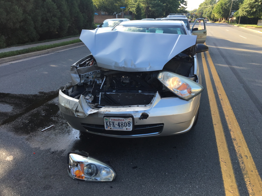 A car involved in an accident sits in the road in July in Virginia. The Consumer Federation of America says it found premium hikes in some cases reaching $400. It looked at premium quotes in 10 cities from five of the nation&#039;s largest auto insurers and found that Progressive aggressively used a not-at-fault penalty, surcharging drivers in eight of the 10 cities. (Jennifer C.