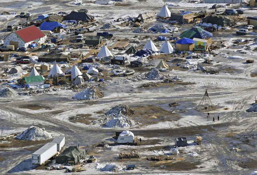 This aerial photo shows the Oceti Sakowin camp, where people have gathered to protest the Dakota Access pipeline on federal land Monday in Cannon Ball, N.D. A federal judge on Monday refused to stop construction on the last stretch of the Dakota Access pipeline, which is progressing much faster than expected.