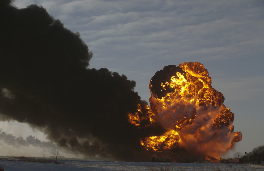 A fireball goes up at the site of an oil train derailment in Casselton, N.D., on Dec. 30, 2013. The National Transportation Safety Board is set to release the cause of the 2013 oil train derailment in eastern North Dakota. The accident happened when a train carrying soybeans derailed in front of an oil tanker train near the small town of Casselton. It caused a series of explosions and the evacuation of about 1,400 residents, but no one was hurt.