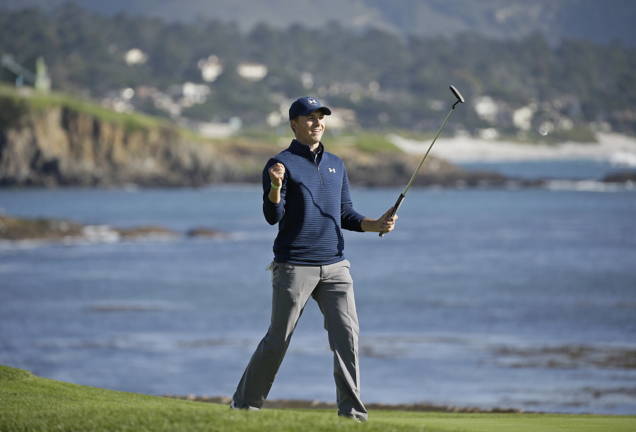 Jordan Spieth reacts on the 18th green of the Pebble Beach Golf Links after winning the AT&amp;T Pebble Beach National Pro-Am golf tournament Sunday, Feb. 12, 2017, in Pebble Beach, Calif.