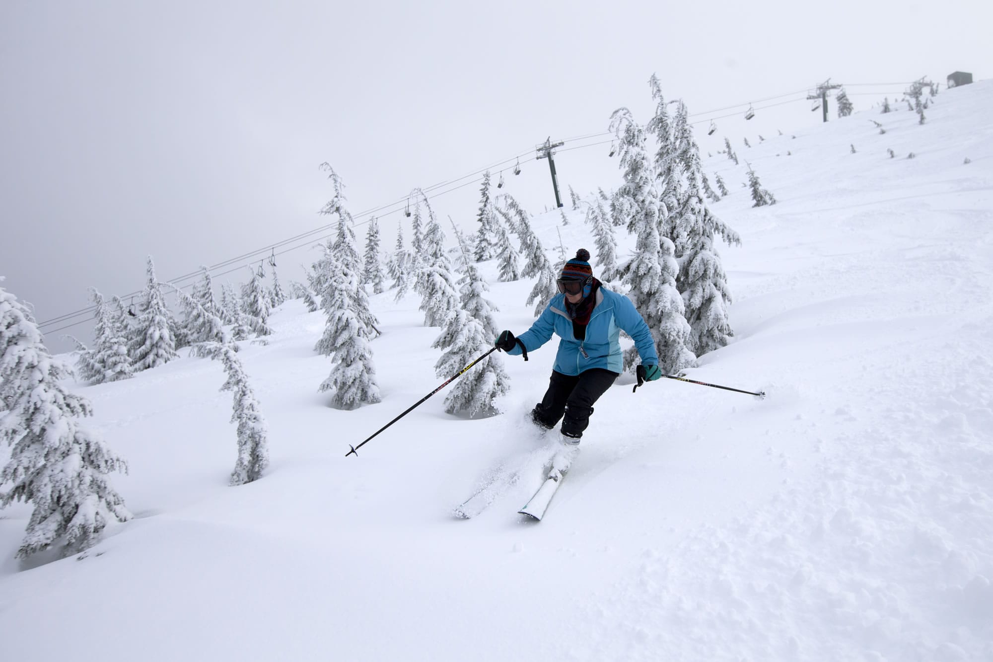 Georgiana Thomas of Corvallis skis down through some fresh snow on the Big Green Machine chairlift at Hoodoo Ski Area.