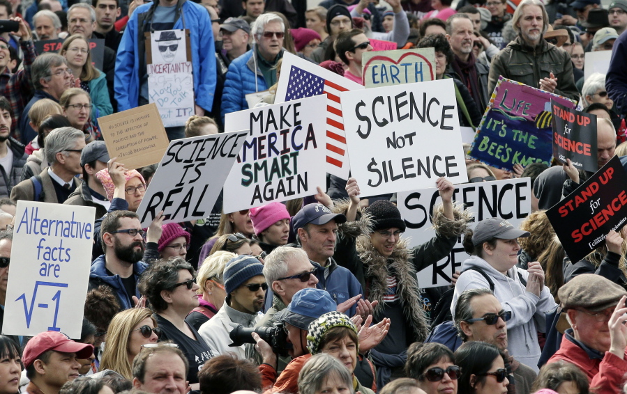 Members of the scientific community, environmental advocates, and supporters demonstrate Sunday in Boston to call attention to what they say are increasing threats to science and scientific research under the administration of President Donald Trump.