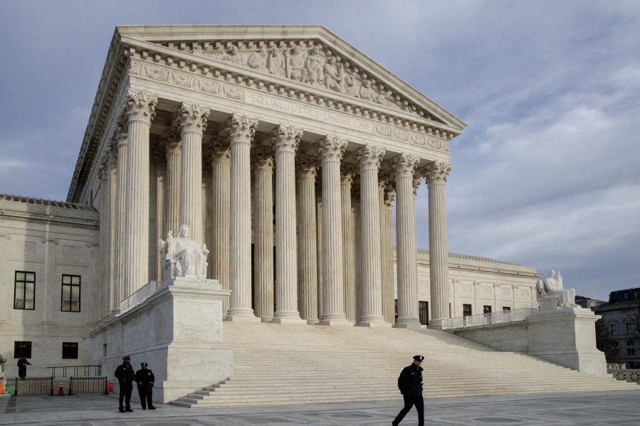 The Supreme Court is seen at day&#039;s end in Washington.   (AP Photo/J.