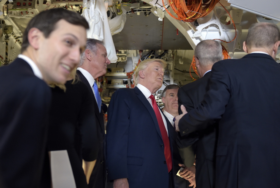 President Donald Trump tours the Boeing South Carolina facility in North Charleston, S.C., on Fridayto see the Boeing 787 Dreamliner. Trump is visiting Boeing before heading to his Mar-a-Lago estate in Palm Beach, Fla. for the weekend. Adviser Jared Kushner is at left.