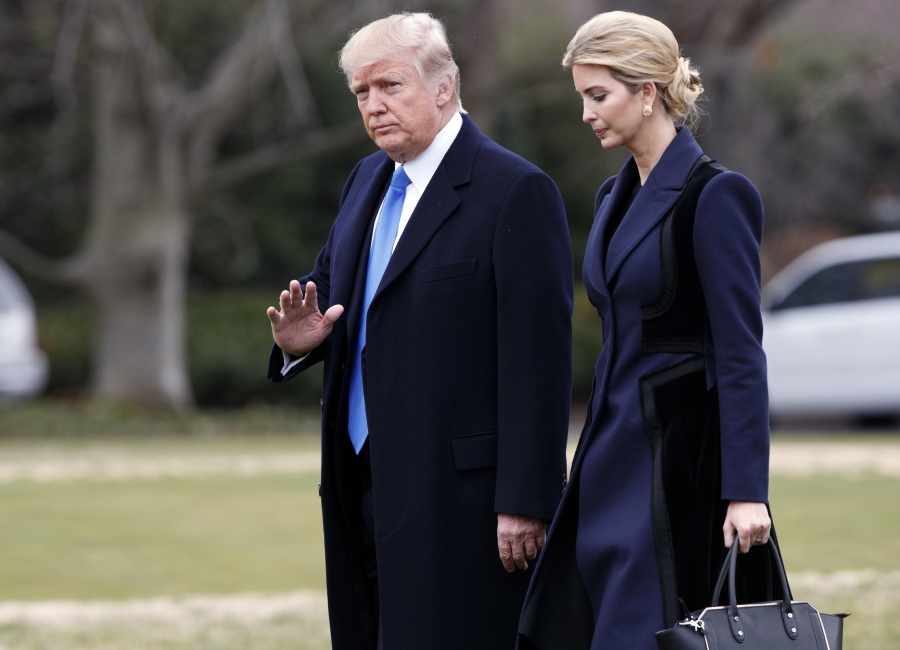 FILE- In this Feb. 1, 2017, file photo, President Donald Trump, accompanied by his daughter Ivanka, waves as they walk to board Marine One on the South Lawn of the White House in Washington. According to officials, Ivanka Trump, who has been a vocal advocate for policies benefiting working women, was involved in recruiting participants for a round table discussion that will be held Monday, Feb. 13, about women in the workforce. President Donald Trump and Canadian Prime Minister Justin Trudeau will participate in the round table.