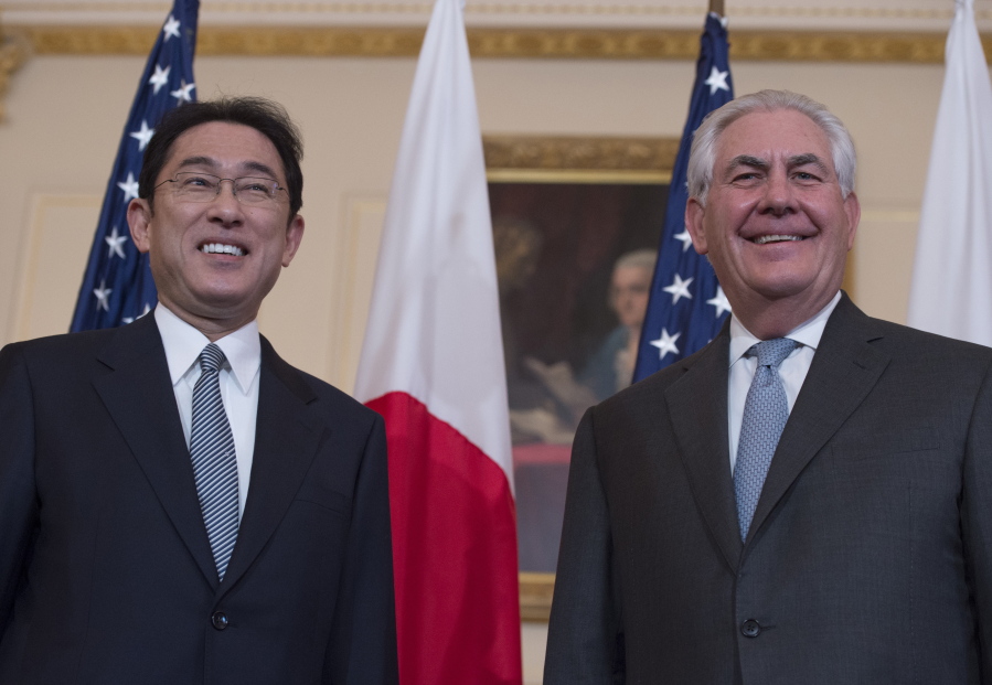 Secretary of State Rex Tillerson greets Japan's Foreign Minister Fumio Kishida, on Feb.
