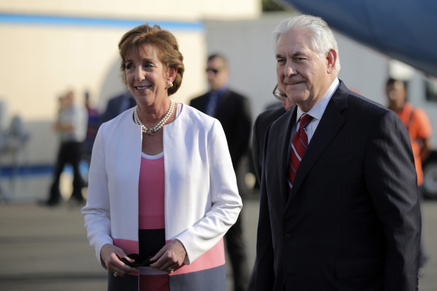 U.S. Secretary of State Rex Tillerson is welcome by U.S. ambassador Roberta Jacobson, left,as he arrives at Benito Juarez international Airport in Mexico City on Wednesday.