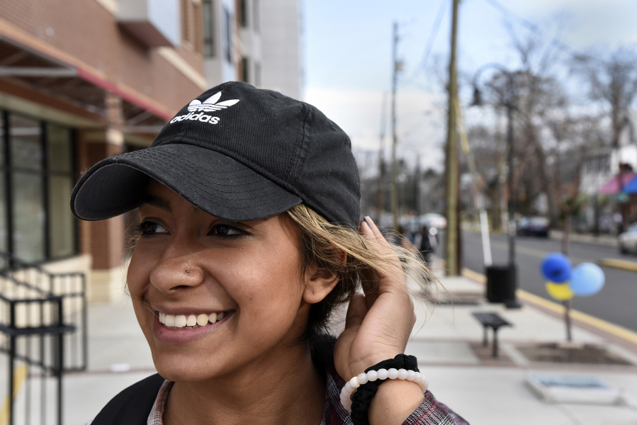 Keli Reyes, a University of Maryland sophomore, wears an Adidas cap in College Park, Md.