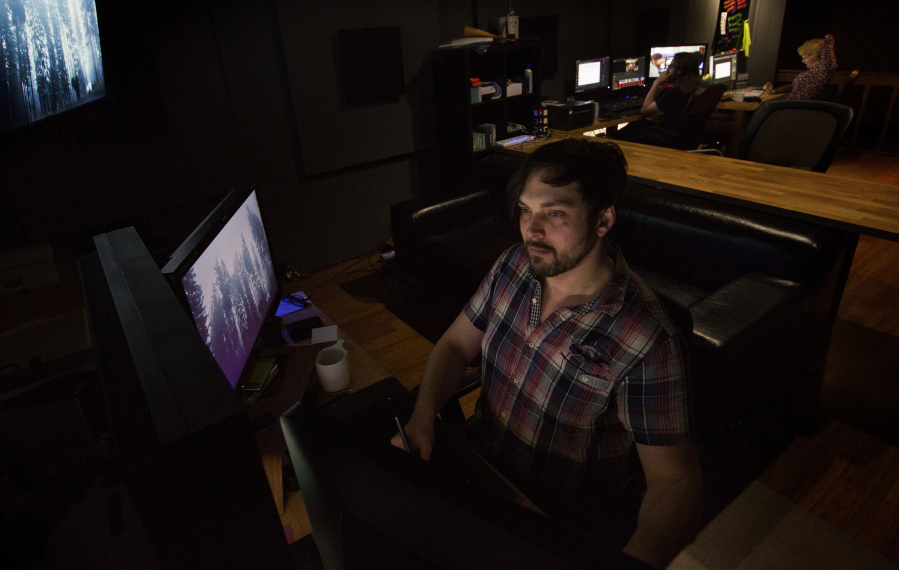 Colorist Jordan Snider&#039;s office is above a coffee shop and bamboo-furniture manufacturer. He brought his digital-production skills from the Los Angeles film industry to Portland, where he started his own company. (Ellen M.