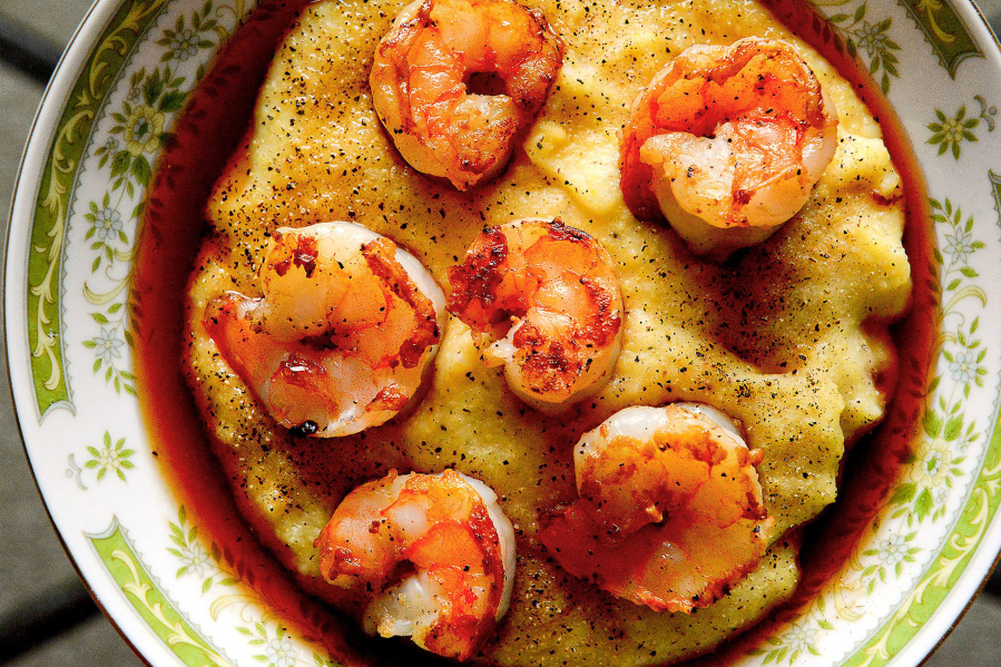 Top pan-seared shrimp with a slightly sweet sherry vinegar-shallot sauce before serving them with Parmesan polenta.