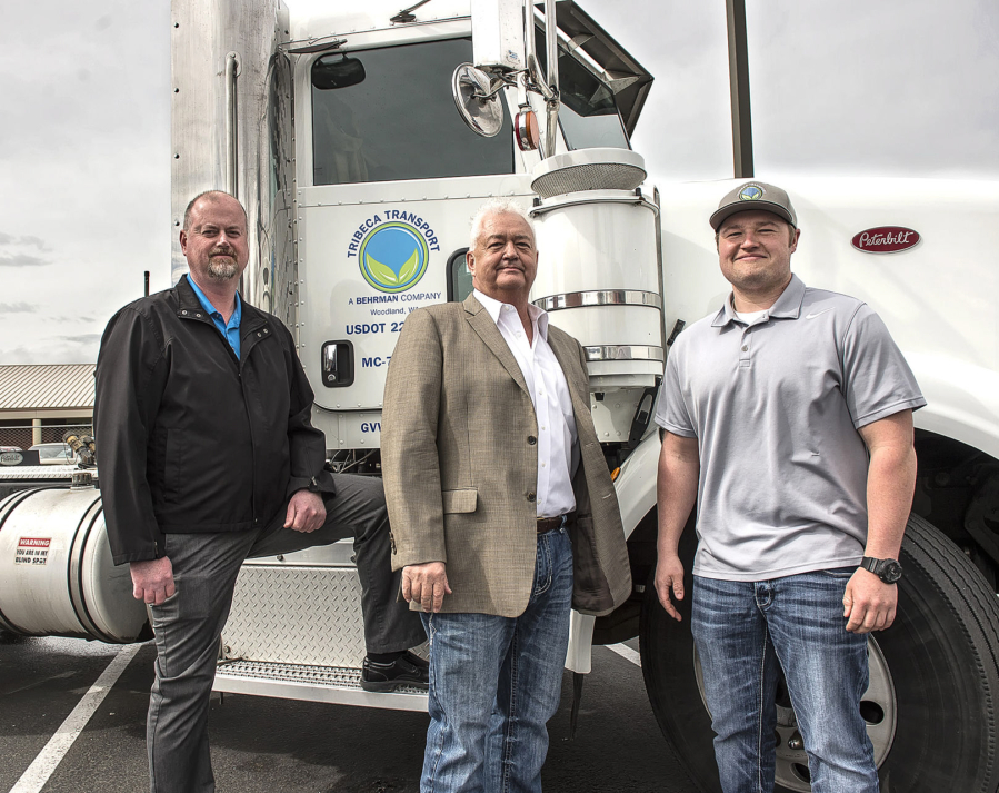 Eric Thwaites, from left, Mike Behrman and Garrett Behrman of Tribeca Transport were honored at Lower Columbia College in Longview for the company&#039;s efforts to reduce unemployment among veterans.